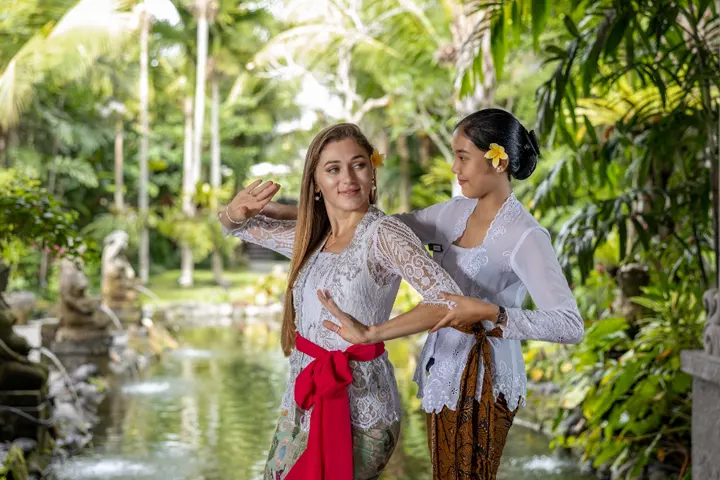 Private Balinese dance performance in a lush garden at The Sankara – Best Resort in Ubud.