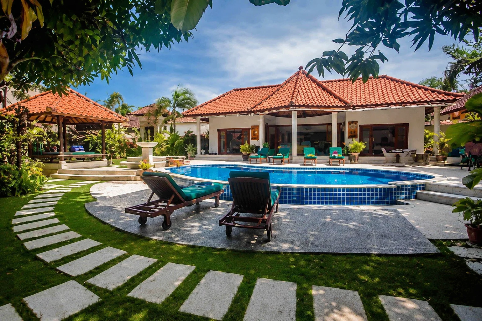 Two-story tropical retreat at Villa Bugis, offering modern comfort in the heart of Luxury Villas Seminyak.