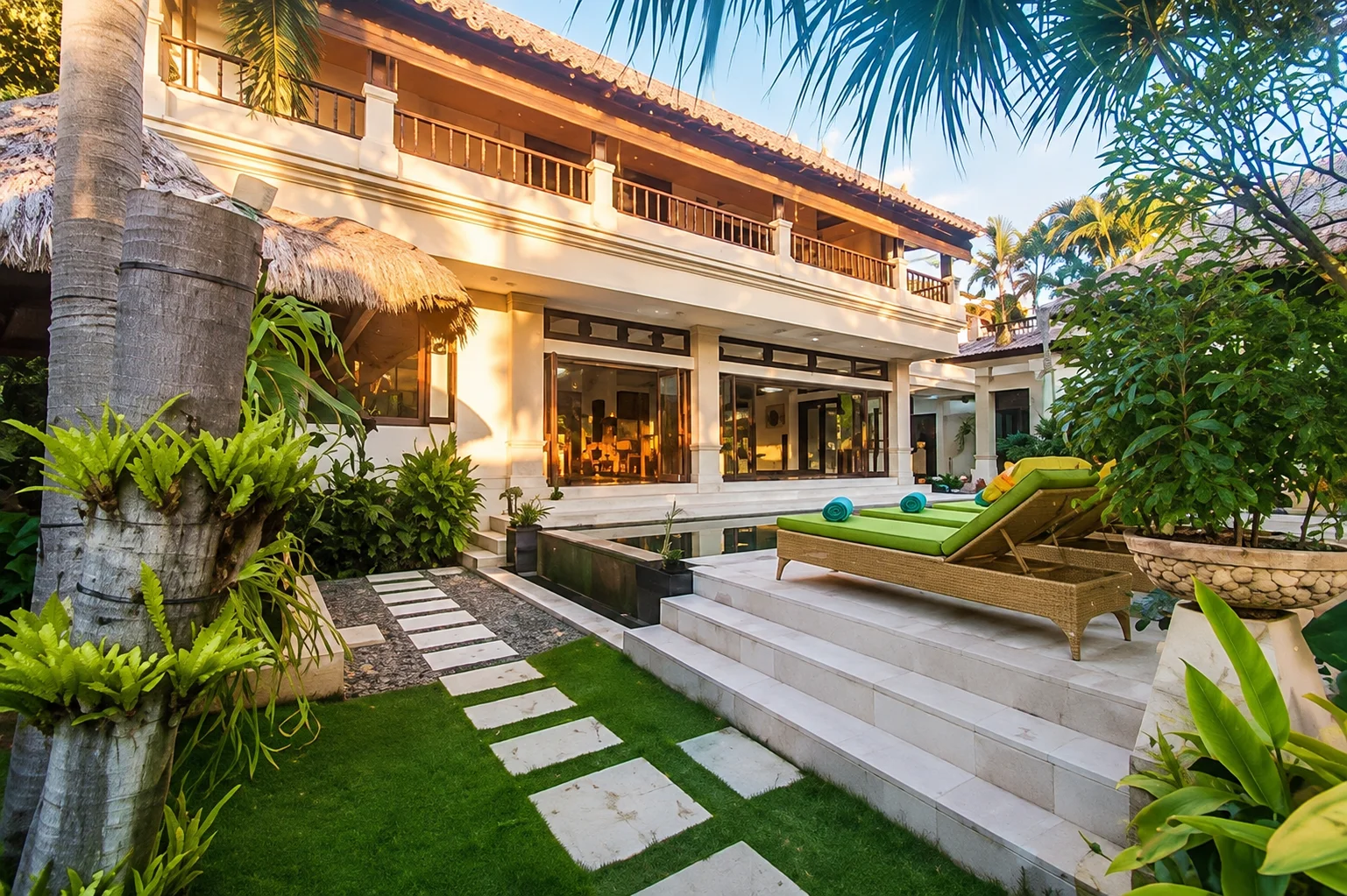 Two-story tropical retreat at Villa Bugis, offering modern comfort in the heart of Luxury Villas Seminyak.