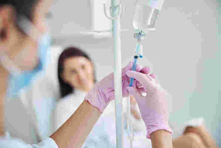Medical professional providing IV infusion in Pererenan and Canggu
